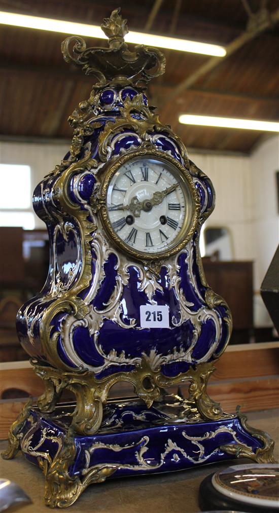 French gilt metal and pottery mantel clock and stand